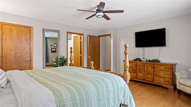 bedroom featuring hardwood / wood-style floors and ceiling fan