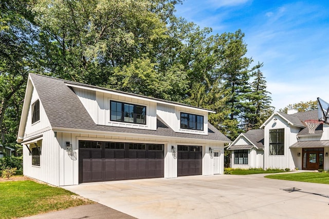 modern farmhouse with a garage