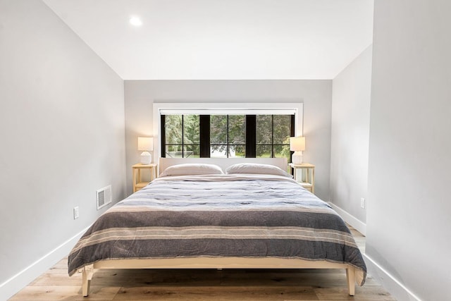 bedroom with light hardwood / wood-style floors