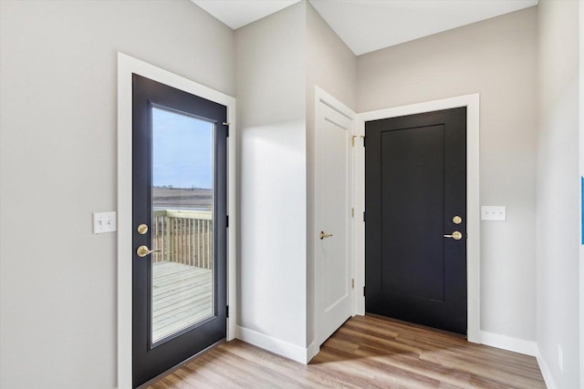 foyer with light hardwood / wood-style flooring