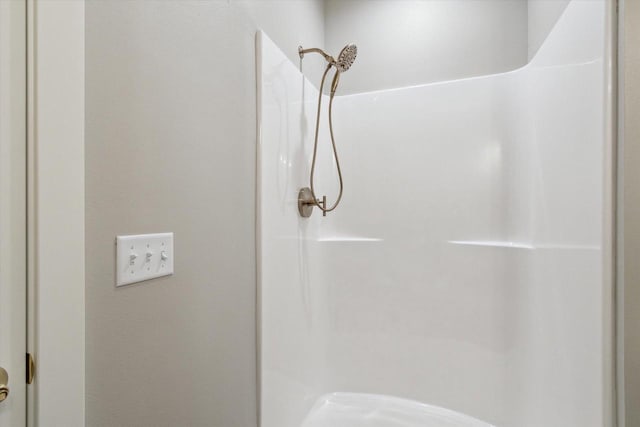 bathroom featuring a shower