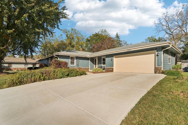 single story home featuring a garage