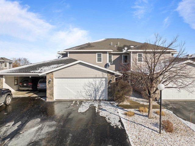 view of front of property with a garage