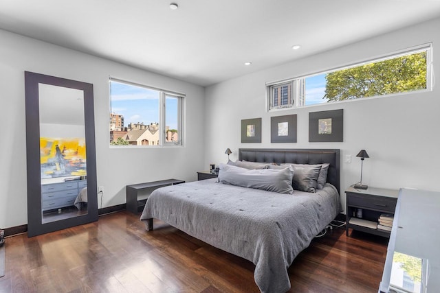 bedroom featuring dark hardwood / wood-style flooring