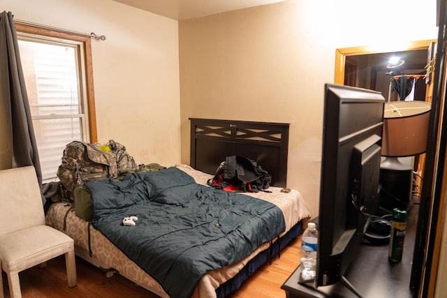 bedroom featuring hardwood / wood-style floors