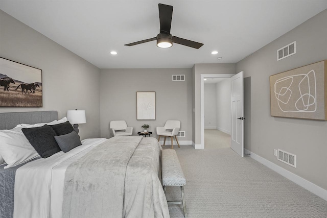 bedroom with light carpet and ceiling fan