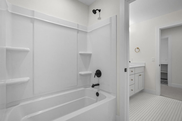 bathroom featuring vanity and washtub / shower combination