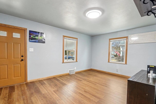 entrance foyer featuring light hardwood / wood-style floors