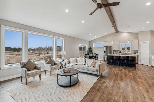 living room featuring ceiling fan, beam ceiling, high vaulted ceiling, and light hardwood / wood-style flooring