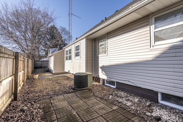 view of property exterior featuring a patio and central air condition unit