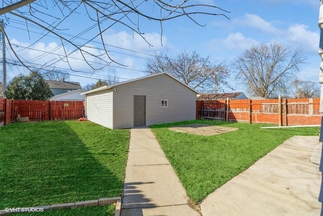 view of yard with an outbuilding and a patio