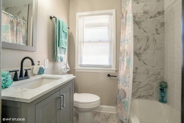 full bathroom featuring vanity, toilet, and shower / bath combo with shower curtain