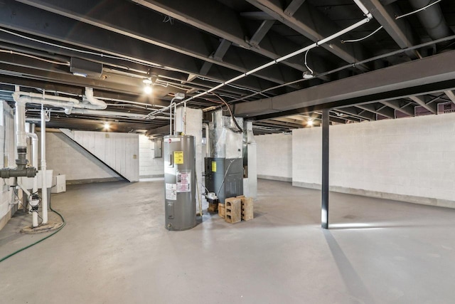 basement with heating unit and water heater