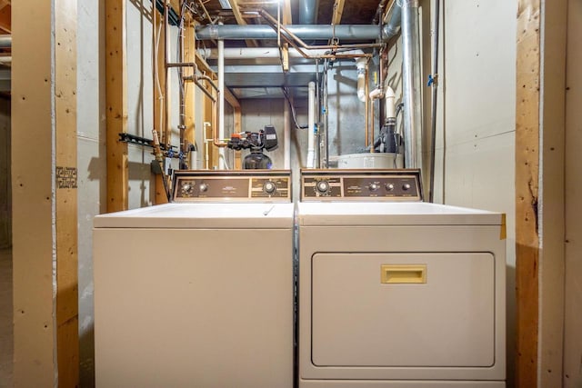 laundry area with laundry area and independent washer and dryer