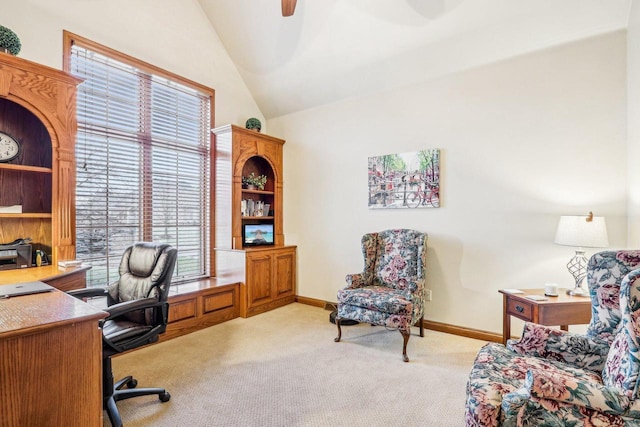 carpeted office with vaulted ceiling