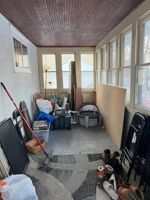 sunroom / solarium with wood ceiling