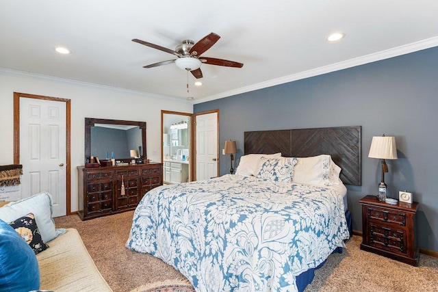 carpeted bedroom featuring ceiling fan, ornamental molding, and ensuite bathroom