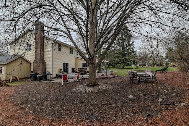 2570 Roanoke Cir, Madison, WI 53719 - view of yard with a patio area and an outdoor structure