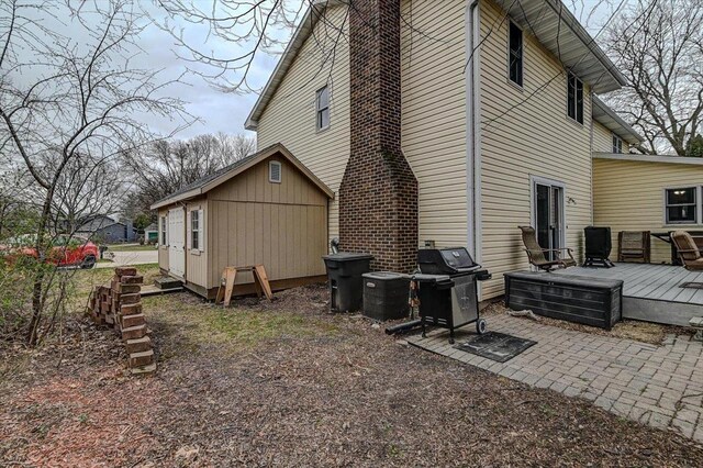 2570 Roanoke Cir, Madison, WI 53719 - rear view of property with a deck and central AC