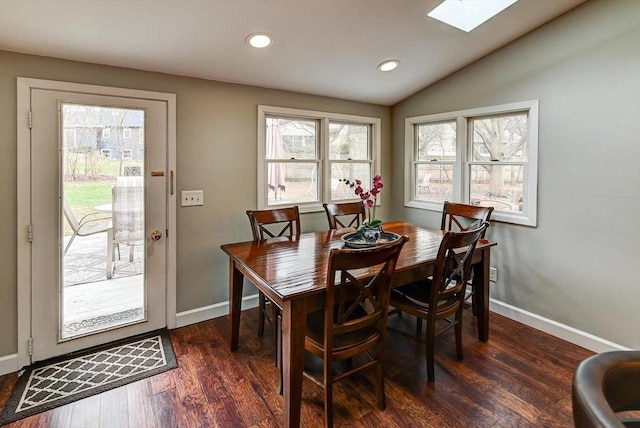 2570 Roanoke Cir, Madison, WI 53719 - dining room with a skylight, baseboards, dark wood-type flooring, recessed lighting, and lofted ceiling