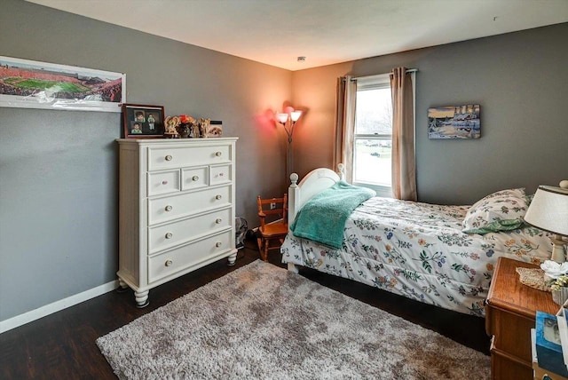 2570 Roanoke Cir, Madison, WI 53719 - bedroom with dark wood-style floors and baseboards
