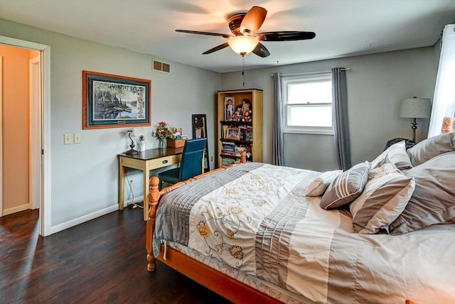 2570 Roanoke Cir, Madison, WI 53719 - bedroom with dark wood-type flooring, baseboards, and ceiling fan