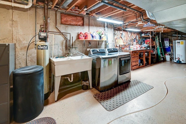 2570 Roanoke Cir, Madison, WI 53719 - unfinished below grade area with water heater, washing machine and dryer, and a sink