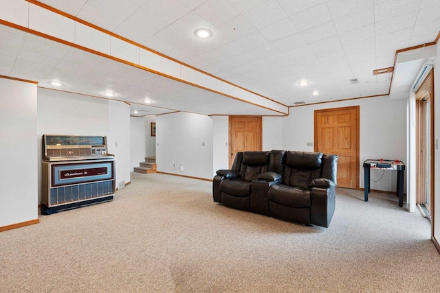 carpeted living room with ornamental molding