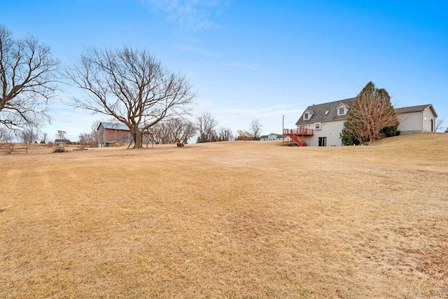 view of yard with a deck