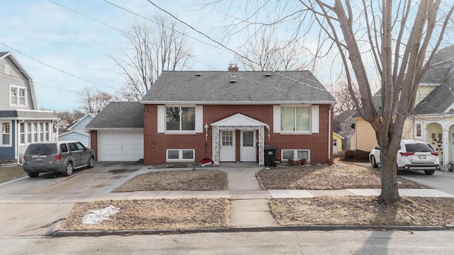 view of front of property with a garage