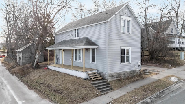 view of property featuring a porch