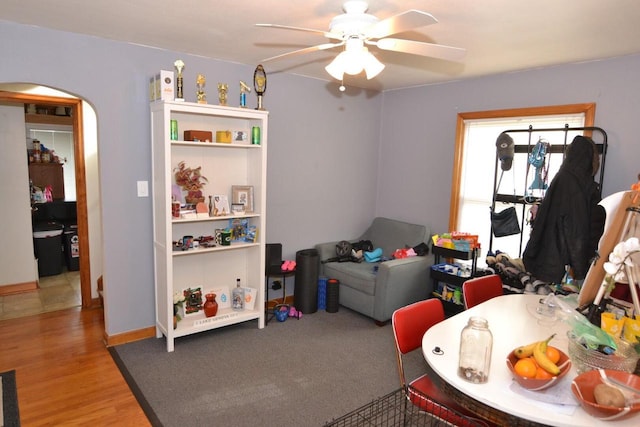 playroom featuring hardwood / wood-style flooring and ceiling fan