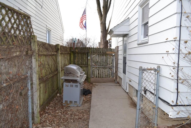 view of patio with a grill