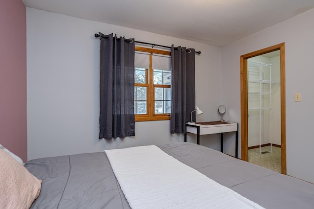 bedroom featuring carpet