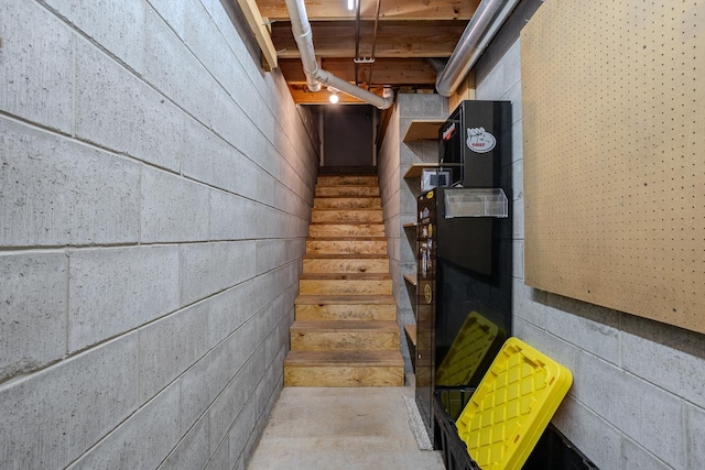 stairs with concrete floors