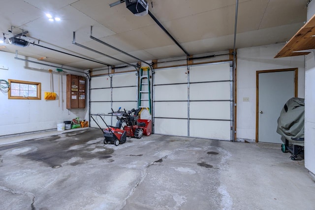 garage featuring a garage door opener