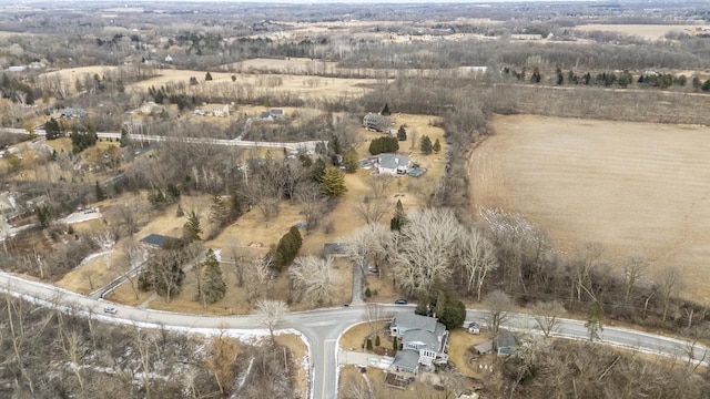 birds eye view of property featuring a rural view