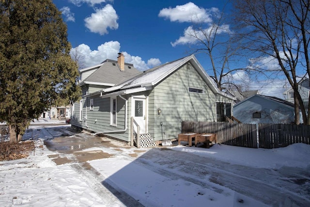 view of snow covered property