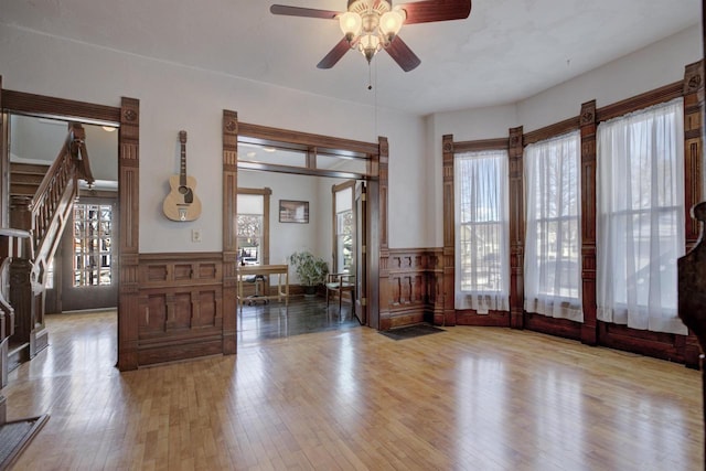 interior space featuring light hardwood / wood-style flooring and ceiling fan