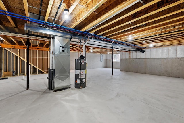 basement featuring heating unit and gas water heater