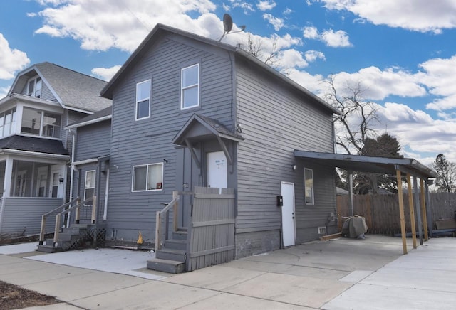 front of property with a carport