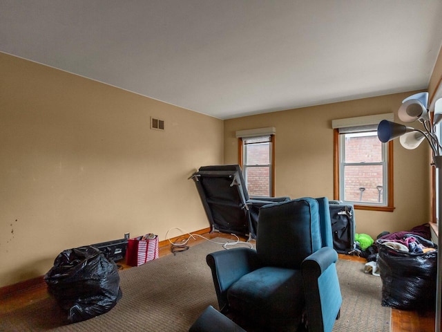 sitting room with light colored carpet