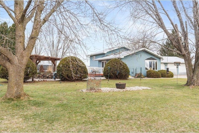 view of side of property featuring a lawn