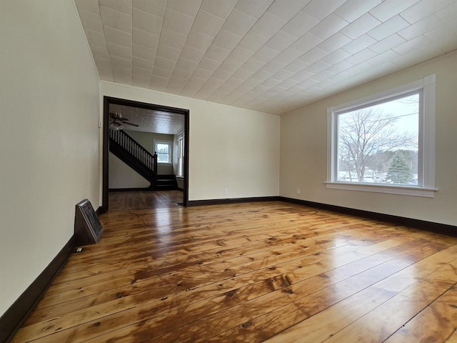 spare room with hardwood / wood-style flooring