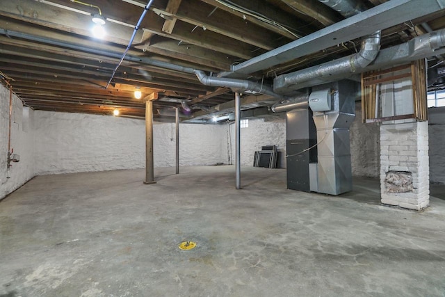 basement featuring heating unit