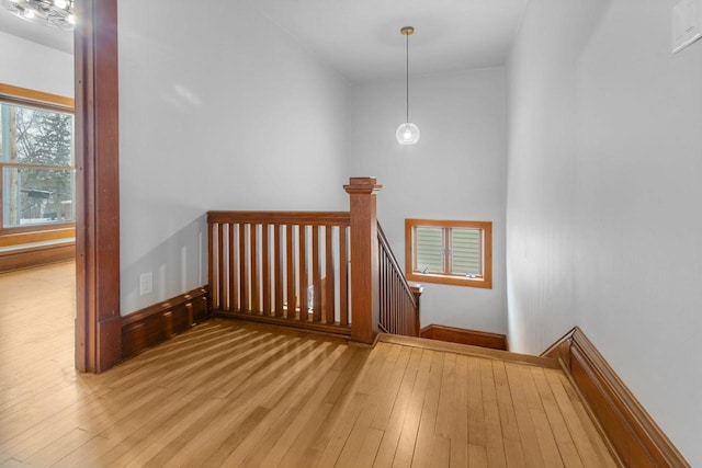 stairs featuring wood-type flooring