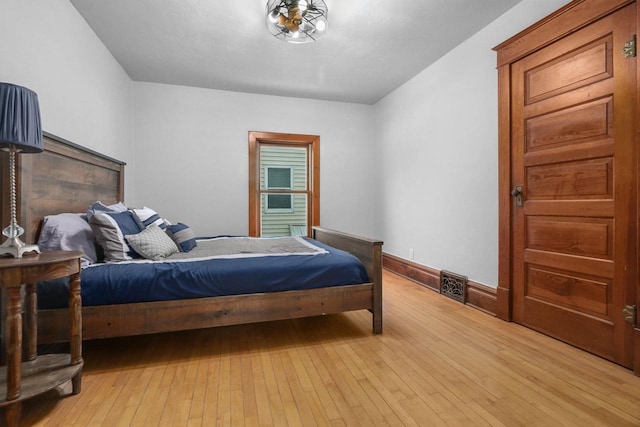 bedroom featuring light wood-type flooring