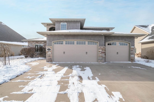 view of front of property with a garage