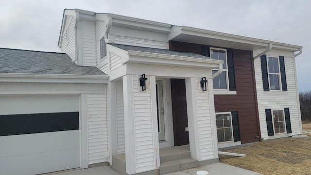 view of front of property featuring a garage