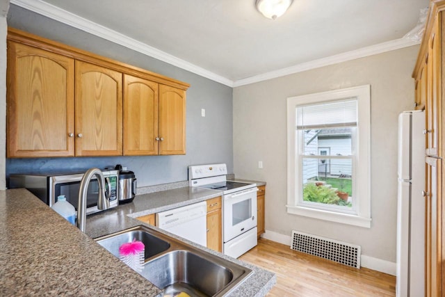 kitchen with white appliances, ornamental molding, and light hardwood / wood-style floors